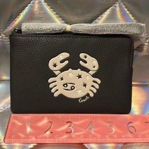 Coach wristlet cancer zodiac sign